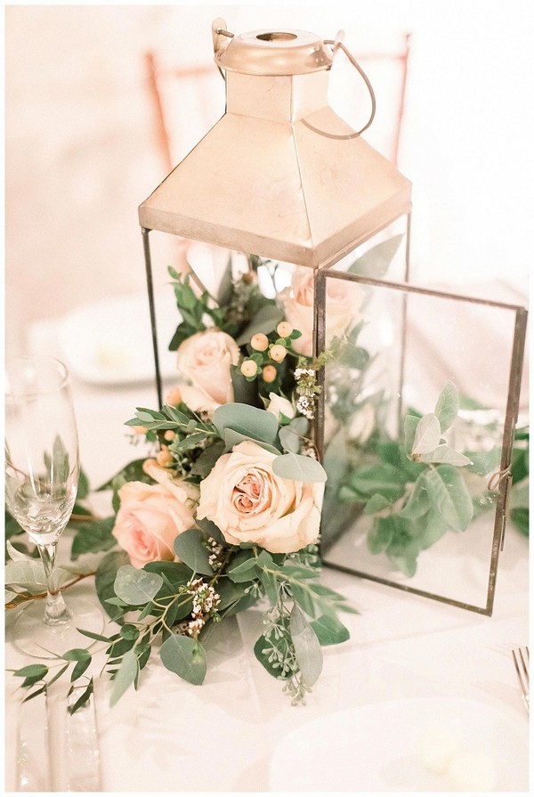 blush roses in gold lantern wedding centerpiece