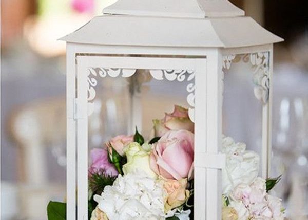 chic white lantern wedding centerpiece with white and blush flowers