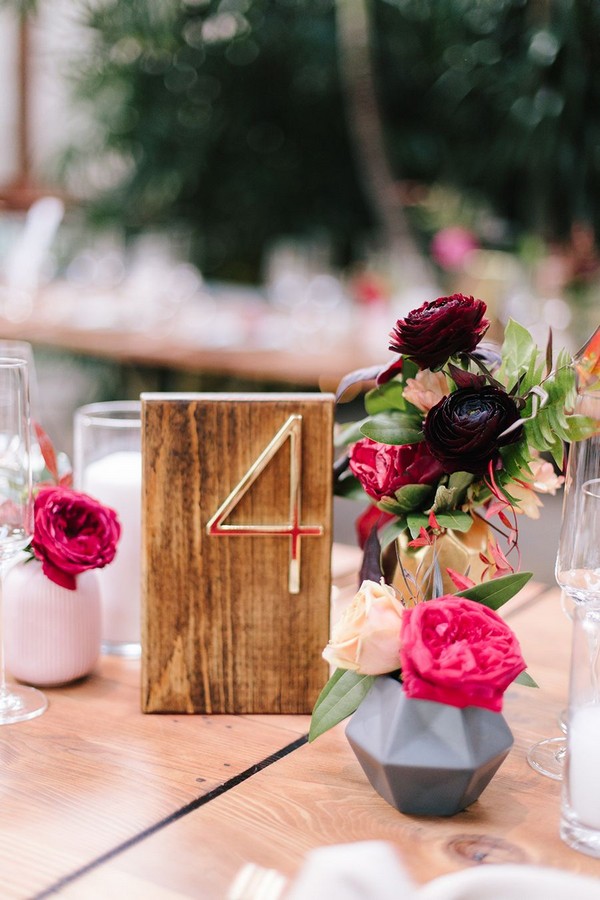 colorful modern wedding centerpiece with wood table number