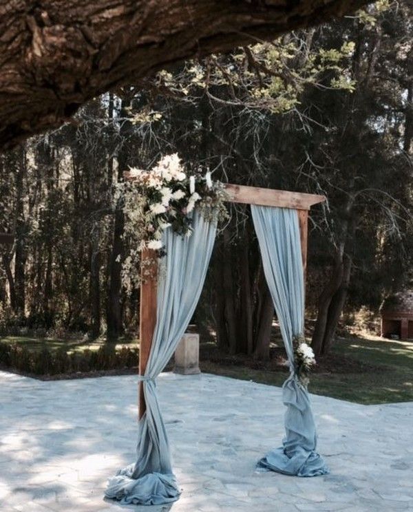 dusty blue wedding arch