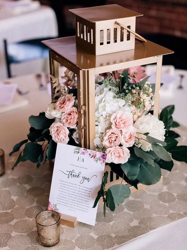 gold lantern wedding centerpiece with blush roses