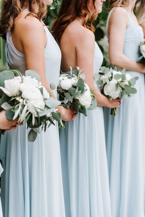 light blue bridesmaid dresses and greenery wedding bouquets