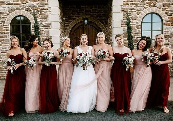 mismatched bridesmaid dresses in blush and burgundy