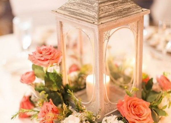 peach roses and wooden lantern wedding centerpiece