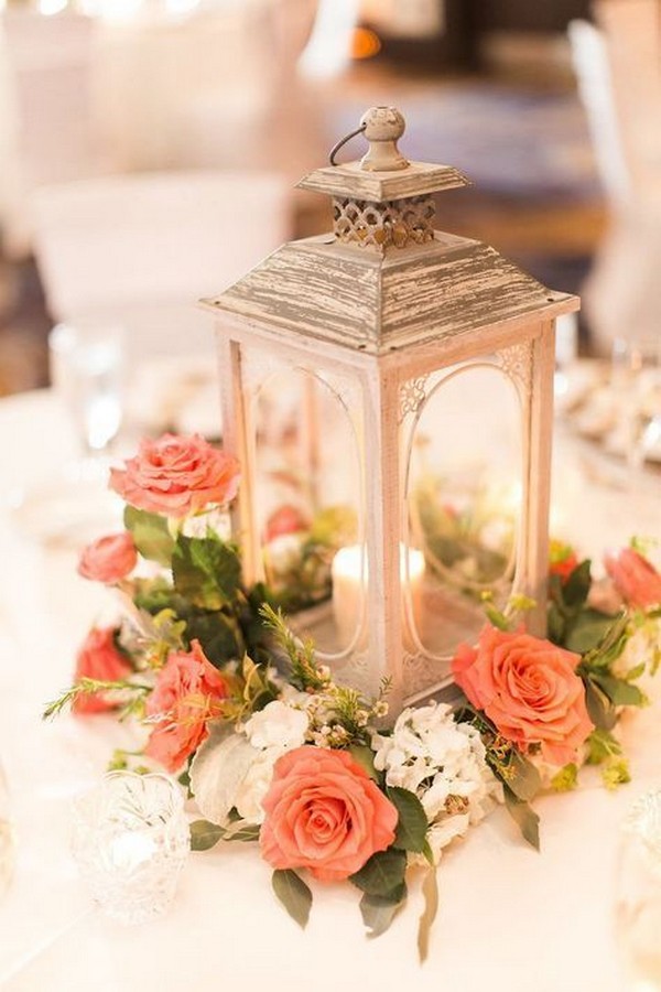peach roses and wooden lantern wedding centerpiece