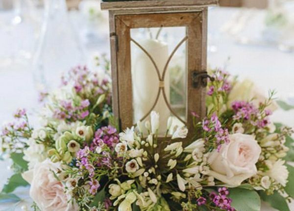 rustic wedding lanterns surrounded by flowers hannah mcclune photography1