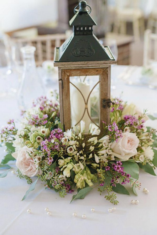 rustic wedding lanterns surrounded by flowers hannah mcclune photography1