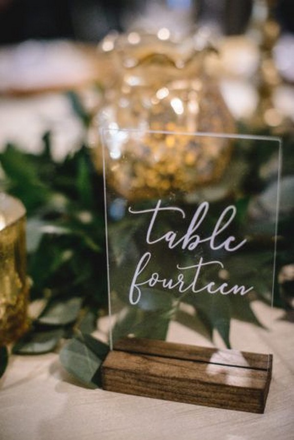 simple acrylic wedding table number with pressed flowers