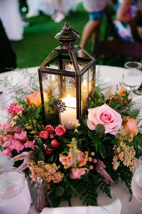 vintage black lantern wedding centerpiece with pink flowers
