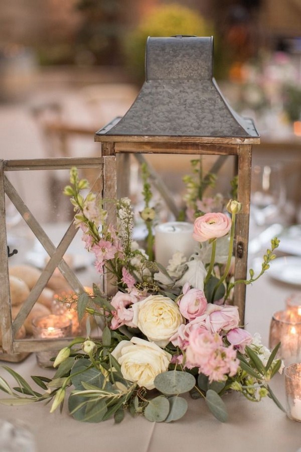 wooden lantern and peach blush roses wedding centerpiece