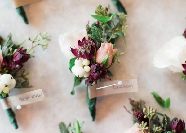 burgundy and green groom corsage