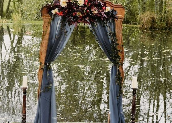 rustic outdoor fall wedding arches and backdrop 13