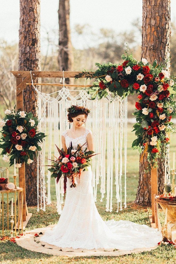 rustic outdoor fall wedding arches and backdrop