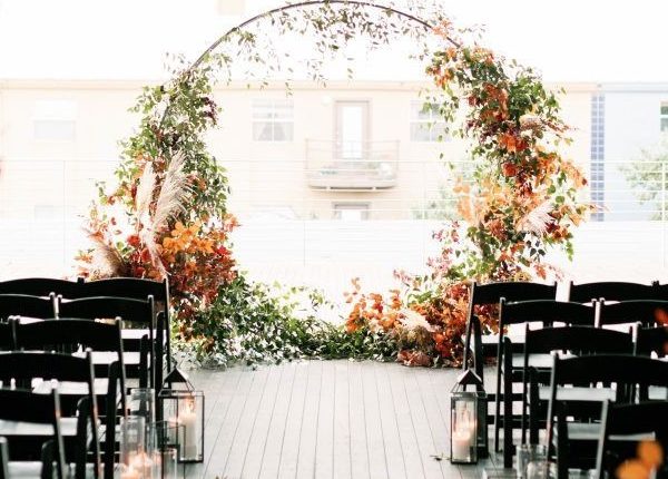 rustic outdoor fall wedding arches and backdrop 23
