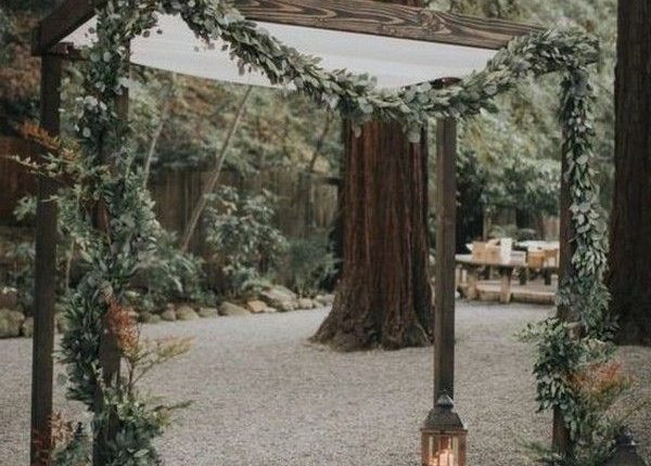 rustic outdoor fall wedding arches and backdrop 27