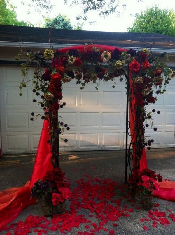 rustic outdoor fall wedding arches and backdrop