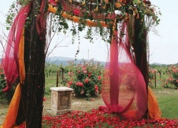 rustic outdoor fall wedding arches and backdrop 29