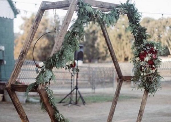 rustic outdoor fall wedding arches and backdrop 31