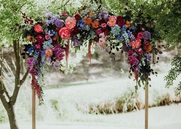 rustic outdoor fall wedding arches and backdrop 7