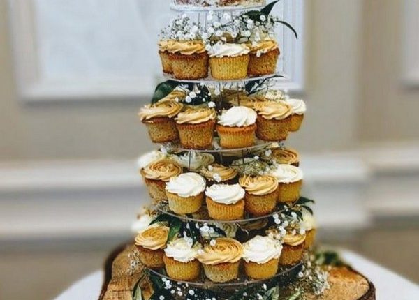 rustic wedding cake with cupcakes