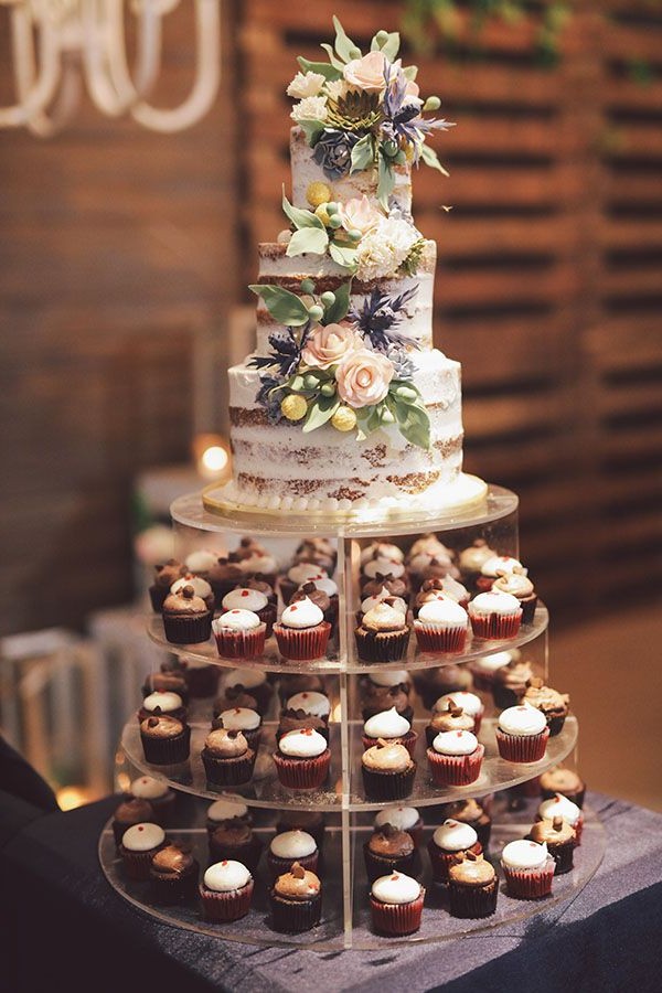 rustic wedding cake with cupcakes