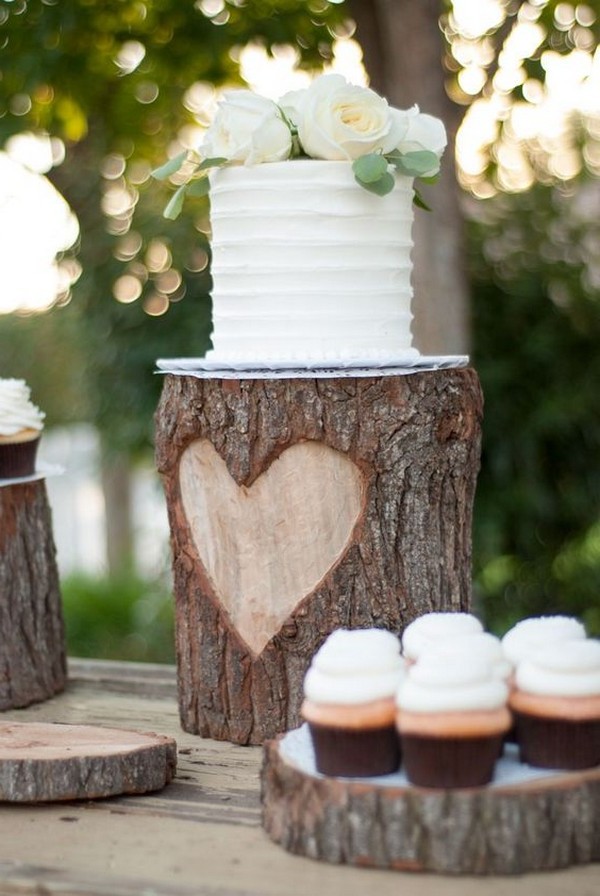 simple rustic wedding cake with cupcakes