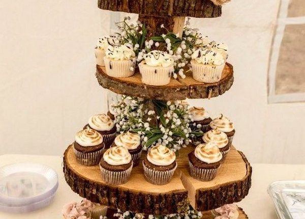 vintage rustic wedding cake with cupcakes