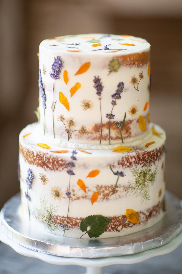 Semi-naked wedding cake with pressed flowers