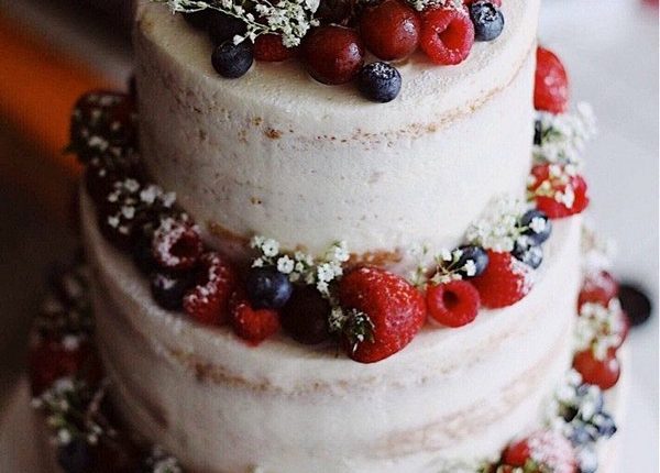 semi naked vanilla cake with fresh fruit