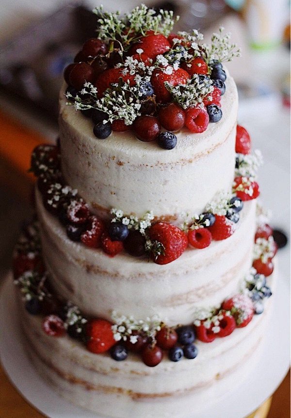 semi naked vanilla cake with fresh fruit