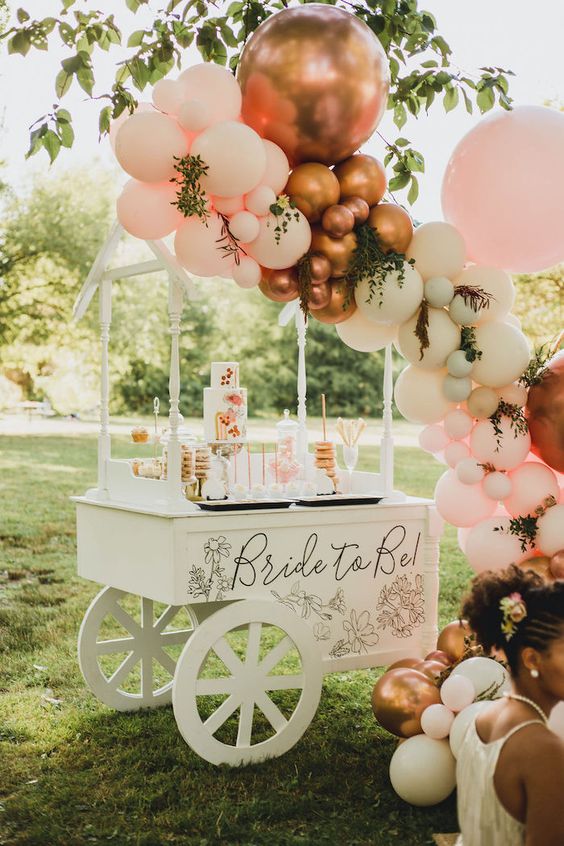 bridal shower theme ideas outdoor garden pink and gold drink bar