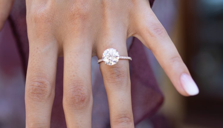 rose gold engagement ring with round diamon