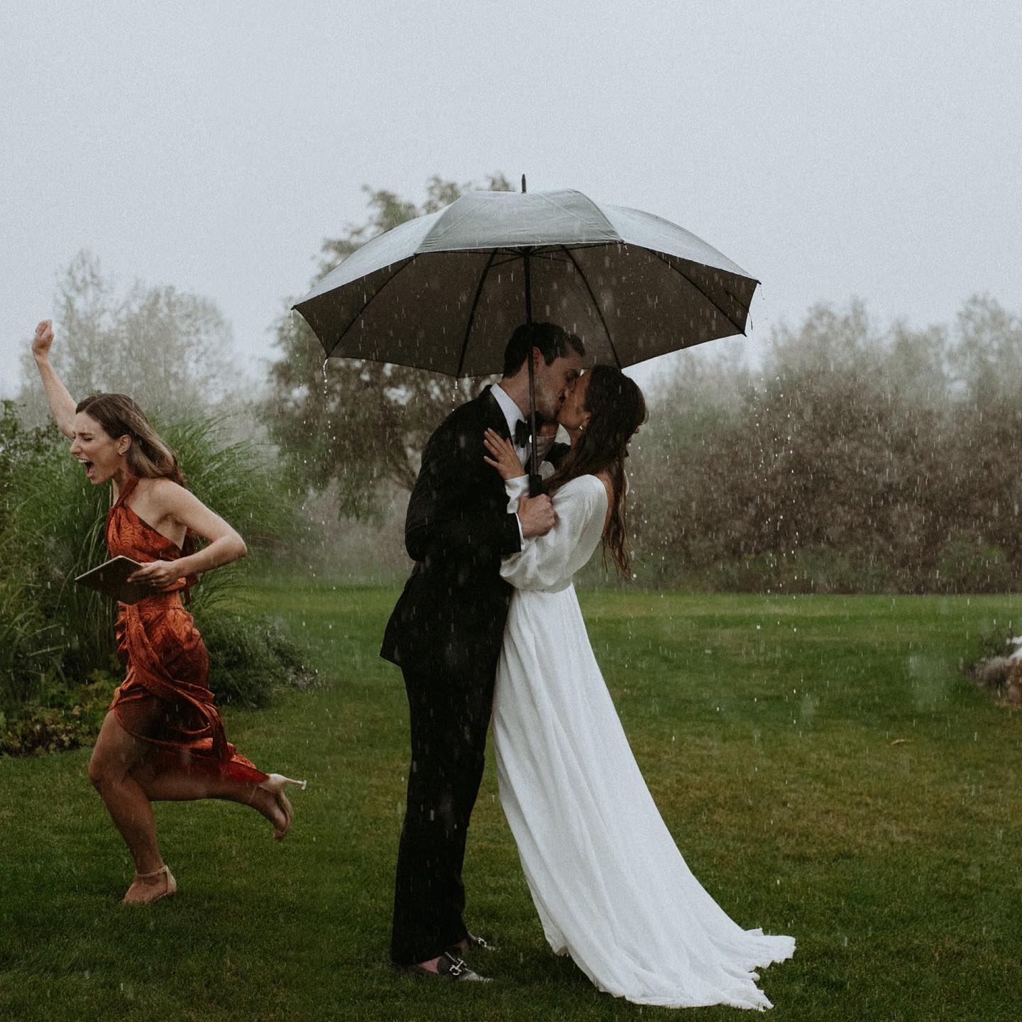 Rain On Your Wedding Day funny wedding photo