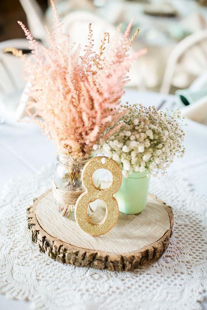 mason jars wedding centerpieces with baby breath and glitter table number
