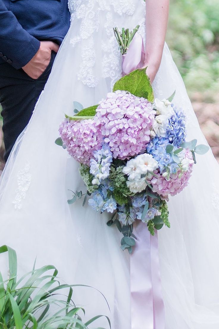 light blue and lavender hydrangea wedding bouquet