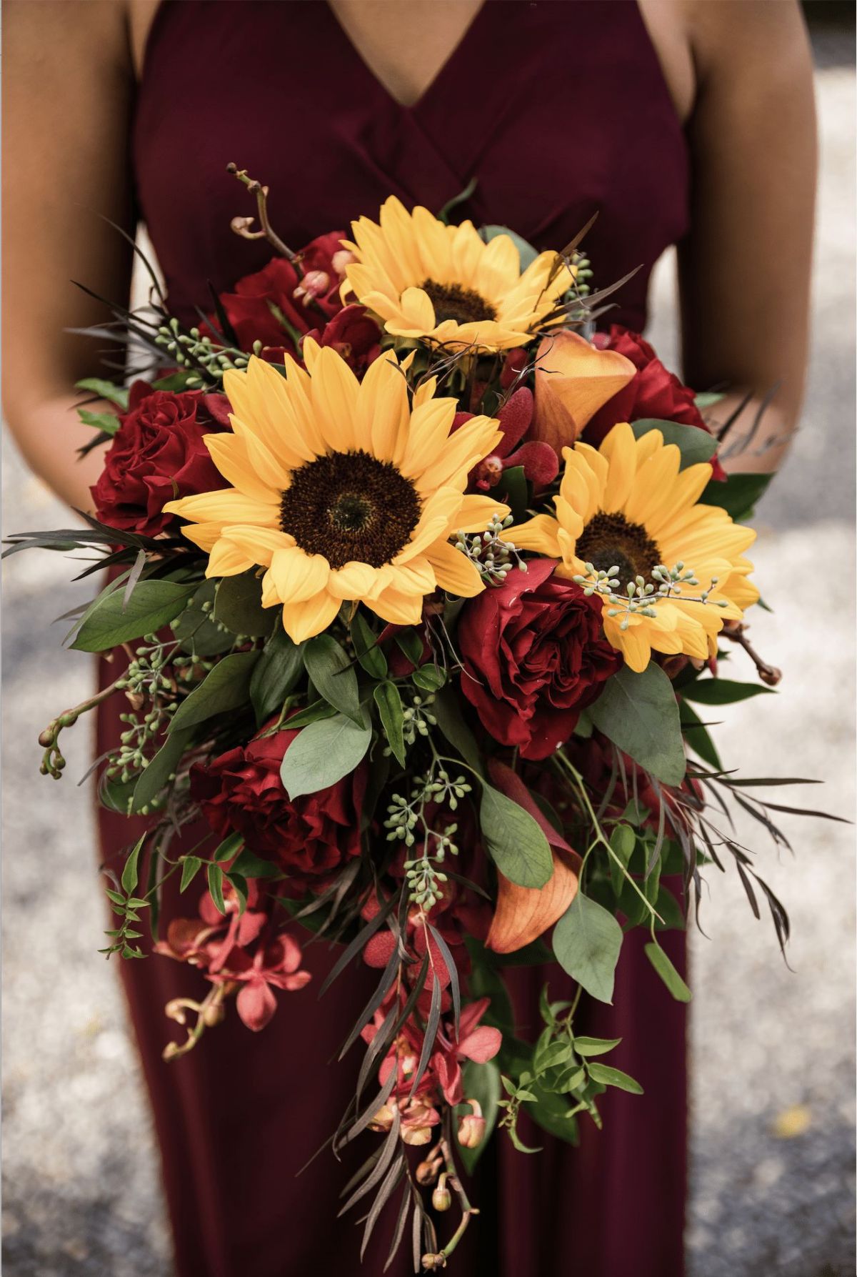 fall burgundy roses and sunflower bridesmaid wedding bouquet